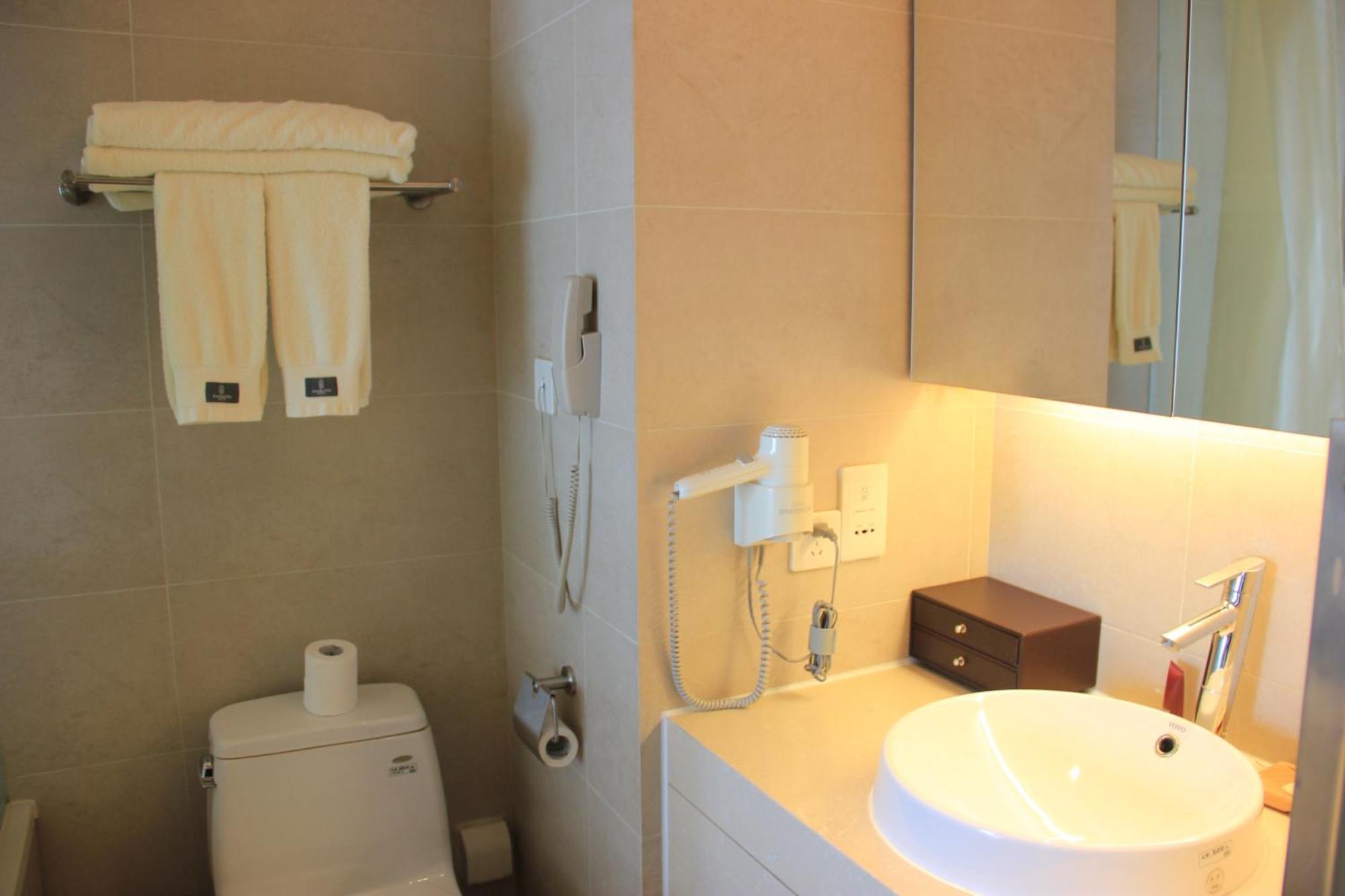 Green Park Hotel Tianjin Binhai  Rom bilde